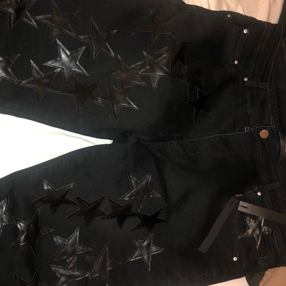 Amiri black star skinny stretch jeans